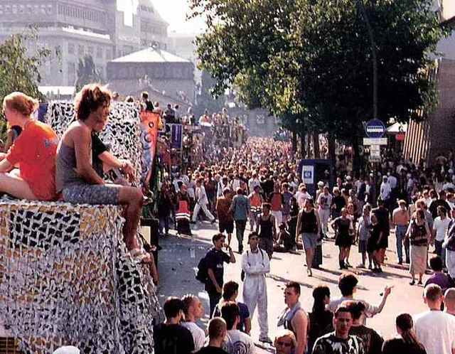 Love Parade Berlin 1995 — aerial view of the parade procession with floats and hundreds of thousands of people filling the street